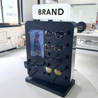 Présentoir pour lunettes et lunettes de soleil en bois, métal et verre pour magasin d'optique, avec support réglable en hauteur et personnalisable