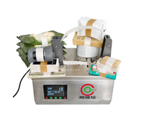 Machine automatique de cerclage de cartons avec bande adhésive, thermoscellante, pour l'emballage manuel des boîtes