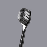 Brosse à dents souple pour adultes, couleur bonbon, avec fil spiralé, prix de gros, emballage individuel pour usage domestique