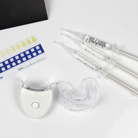 Vente en gros CE dentaire à la maison 2022 Kit de blanchiment des dents UV Logo privé Kit de blanchiment des dents professionnel avec lumière LED
