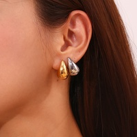Nouvelles boucles d'oreilles pendantes en forme de goutte d'eau creuses pour femmes, plaquées or, en acier inoxydable