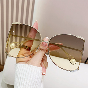 Gafas de sol de moda sin montura con perlas, rectangulares, UV400, protección solar para mujer - Product Image 1