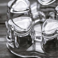 Vente en gros de bougies de luxe grands bocaux à bougies en verre résistant à la chaleur en forme de coeur bougeoir pour chauffe-théière