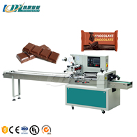 Machine à emballer mobile horizontale pour tablettes de chocolat Oreiller Barre de chocolat Film d'emballage Feuille de papier plastique Noyau de moteur