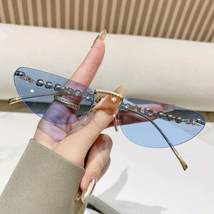 Lunettes de soleil pour femmes, style streetwear, nouvelle collection, lunettes de soleil œil de chat en métal avec incrustations de perles, protection UV - Product Image 2