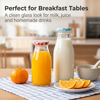 Bouteille de jus en verre transparente ronde de luxe de 16 oz et 32 oz pour le lait avec bouchon à vis en métal