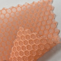 Tissu en maille respirant en forme de nid d'abeille 100% polyester stocké pour masque