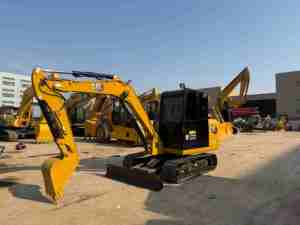 Excavadora de cadenas CAT 306E2 usada y confiable, de cuerpo compacto, ideal para excavaciones en jardines, reparación de caminos rurales, renovación de interiores y pequeños proyectos. - Product Image 2