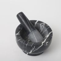 Mortier et pilon en granit à prix avantageux avec un ensemble en marbre noir à utiliser en cuisine