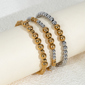 Bracelet élastique demi-lune céleste en perles or et argent, moitié supérieure or, moitié inférieure argent, quatre grands accents dorés, cadeau pour femme - Product Image 1