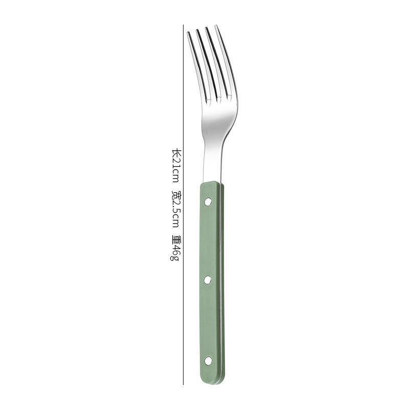 Dinner fork with green handle