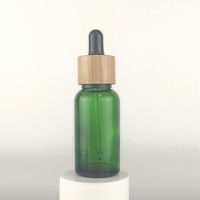 Flacon compte-gouttes en verre de 30 ml, flacon compte-gouttes résistant aux enfants de 1 oz, flacon d'huile essentielle bleu ambre avec compte-gouttes en bambou pour huile corporelle