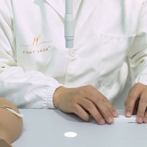 Pinky Leem + الأكثر مبيعًا أداة تجميل معدنية بإضاءة UV مصباح لاصق لتمديد الرموش - Product Image 1