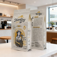 Sac d'emballage de café personnalisé imprimé en gravure de sécurité, vente chaude 2026, 500g 1kg, avec valve haute pour pochette à fond plat