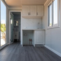 Conteneur de bureau portable préfabriqué moderne et empilable à faible coût, maison conteneur préfabriquée de 20 pieds en kit plat