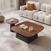 Table basse moderne minimaliste de luxe en pierre frittée écologique, aspect marbre, avec base en métal, pour salon