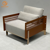 Italienischer Designer-Sessel aus hochwertigem Stoff, leichter Luxus-Einzelsessel für Esszimmer und Freizeit, schlichter, kreativer Loungesessel für das Wohnzimmer