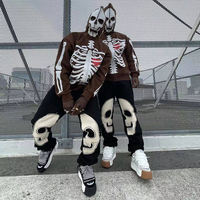 Pantalon en coton pour hommes Streetwear pantalon de survêtement à slogan personnalisé pour hommes crâne Patchwork broderie polaire pantalon empilé
