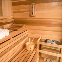 Sauna extérieur moderne en bois de pruche massif avec fenêtres à transom, panneau de commande informatisé et fonction vapeur humide pour villa