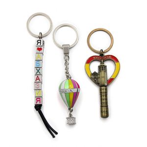 พวงกุญแจโลหะผสมสังกะสีคุณภาพสูง ชุบทองเคลือบเงา สำหรับสร้างแบรนด์ - Product Image 2