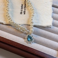 Colliers en perles d'imitation de style français pour femmes, légers et extravagants, avec des gouttes de cristal bleu, chaîne de clavicule, bijoux