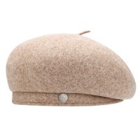 Chine Xinxing nouveau Style minimaliste à large bord 100% laine à la mode polyvalent métal Logo artiste casquette béret chaud pour une utilisation en extérieur