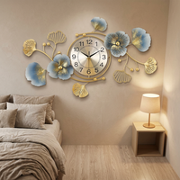 Jam Dinding Besar Modern Mewah Berbahan Logam, Bercahaya, Tanpa Suara, Ukuran 33x19 Inci, Motif Daun Ginkgo, Jarum Biru Emas, Dilengkapi Kalender, untuk Dekorasi Rumah dan Ruang Tamu
