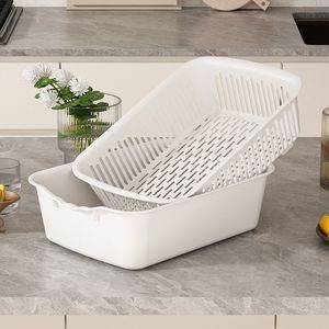 Grand panier égouttoir en plastique irrégulier blanc pour la cuisine domestique, idéal pour les fruits et légumes - Product Image 1