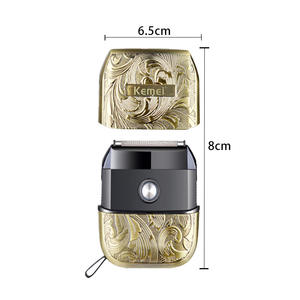 เครื่องโกนหนวดไฟฟ้าขนาดพกพา Kemei สำหรับผู้ชาย ตัวเครื่องโลหะ 6.5 ซม. x 8 ซม. ใช้พลังงานจากแบตเตอรี่แบบชาร์จได้ - Product Image 1