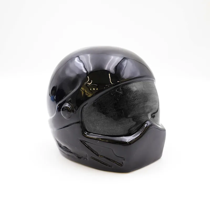 Urnas de cremación OEM para adultos para cenizas casco de motocicleta de tamaño mediano personalizado tributo a cualquier urna de cerámica negra temática de motocicleta