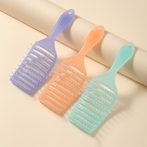 Mini cepillo de pelo de masaje en forma de huevo con logotipo personalizado, peine de peluquería portátil resistente al calor para desenredar en húmedo para mujeres - Product Image 3