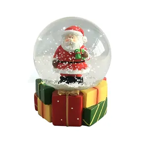कस्टम व्यक्तिगत बर्फ की गेंद थोक अद्वितीय क्रिसमस उपहार राल बर्फ ग्लोब उच्च गुणवत्ता के साथ कस्टम डिजाइन Polyresin