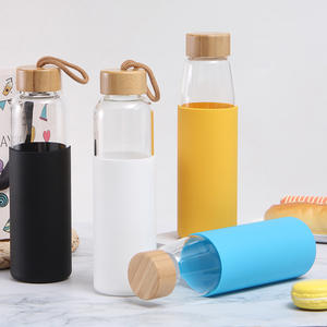 <span class=keywords><strong>Incassable</strong></span> Résistant À La Chaleur Logo Personnalisé Bouteille D'eau <span class=keywords><strong>En</strong></span> <span class=keywords><strong>Verre</strong></span> Avec Manchon <span class=keywords><strong>En</strong></span> Silicone - Product Image 1