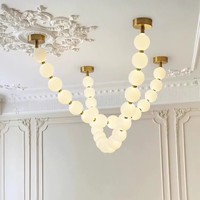 Lampes suspendues minimalistes d'art nordique, luminaire suspendu moderne, luminaire suspendu à intensité variable, lustre en forme de collier de perles pour salon