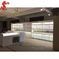 Conception de magasin d'ordinateur moderne de détail de mode personnalisée/magasin d'ordinateur portable vitrine en verre vitrine murale