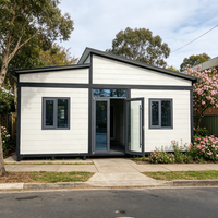 Maison conteneur préfabriquée modulable pour le stockage et l'expédition, avec salle de bain intégrée, double aile pliable et panneau décoratif en métal