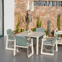 Ensemble table et chaises Osidi en alliage d'aluminium moderne, non pliable, au design technologique robuste, pour usage en extérieur, fabriqué en Chine