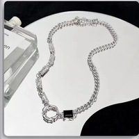 Collier en acier inoxydable le plus vendu pour hommes et femmes, simple et polyvalent, avec incrustation de pierres précieuses noires et design irrégulier