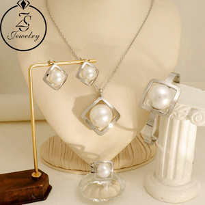 Toptan altın kaplama yuvarlak inci kadın paslanmaz çelik takı <span class=keywords><strong>Set</strong></span> altın kaplama inci kolye daire kolye küpe - Product Image 2