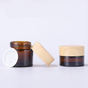 Hot Sale 5g 10g 15g 20g 30g 50g 100g Facial Care Cosmetic Packaging Amber Brown Cosmetic Glass Cream Jar with Dark <b>Wood</b> Lid - Product Image 5