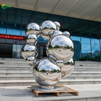 Sculpture sphérique moderne en acier inoxydable poli de luxe personnalisable de 2,2 m pour décoration extérieure de jardin et centre commercial