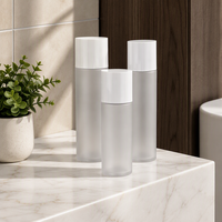 Bouteilles givrées à étiquette privée 100ml/150ml/200ml avec grand couvercle blanc mat pour les soins de la peau, tonique, sérum, huiles essentielles
