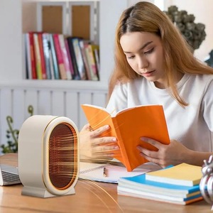 เครื่องทำความร้อนไฟฟ้าแบบตั้งโต๊ะ PTC สำหรับใช้ในบ้าน สำนักงาน ห้องนอน พกพาสะดวก ให้ความอบอุ่นเงียบ ป้องกันความร้อนเกิน พร้อมพัดลมเป่าลมร้อน - Product Image 5