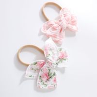 Accessoires pour cheveux en coton mousseline 100% avec des imprimés floraux en nylon de différentes couleurs et un nœud élastique pour les tout-petits