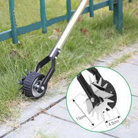 Tondeuse rotative à roues portative manuelle noire de déligneuse de pelouse pour la cour de trottoir de jardin, outil de pelouse de déligneuse