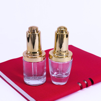 Flacon compte-gouttes en verre dépoli transparent de 30 ml (1 oz) avec bouton poussoir doré ou argenté pour sérum et huiles essentielles cosmétiques