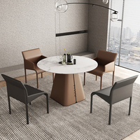 Moderner leichter Luxus-runder Tisch Minimalisti scher Stil Familie Kleine flache Fels platte mit Plattenspieler Sattel leder Esstisch