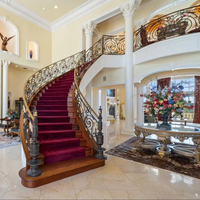 Escalier en colimaçon économique moderne de Foshan, forme incurvée double hélice, en acier galvanisé, avec garde-corps en verre, pour villa intérieure