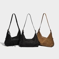 Sac à main de haute qualité 2026 Style rétro Sac à bandoulière de créateur Pompons Sangle réglable Élégant Sac hobo en cuir vegan pour femmes