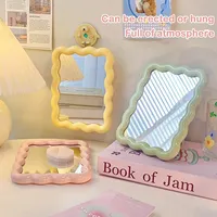 Miroir de maquillage pliable de style crème avec bord ondulé nuageux, idéal pour bureau et dortoir - Vente en gros